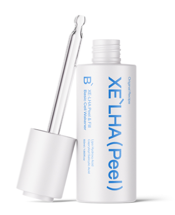白いボトルに入った「XE'LHA(Peel)」美容液とスポイト